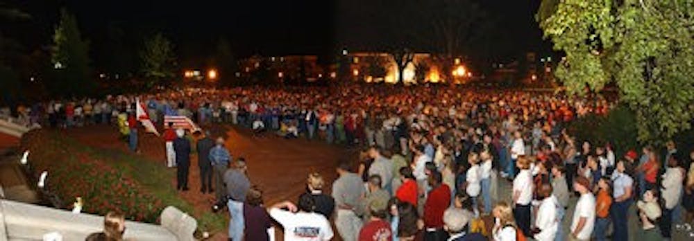 After Sept. 11, 2001, the Auburn community mourns those lost during a candlelight vigil on Samford Lawn. (CONTRIBUTED)