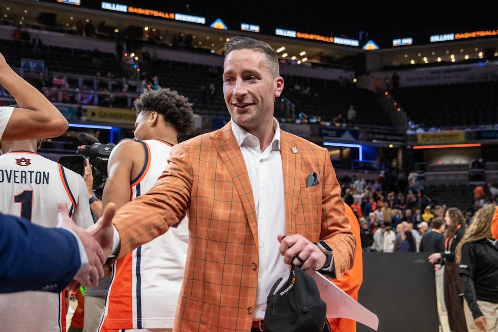 <p>Coach Steven Pearl celebrates winning the NIT championship against Tulsa in Gainbridge Fieldhouse in Indianapolis, Ind on April 5, 2026.</p>