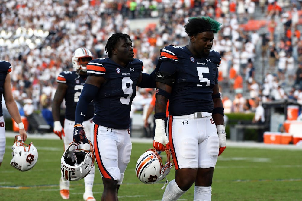 <p>Players exit the field feeling dejected after a tough game at Jordan Hare Stadium on Sep. 17, 2022.</p>