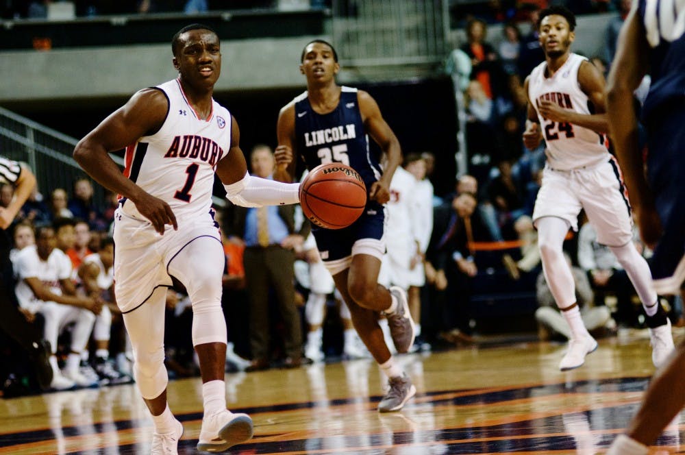 Jared Harper (1) drives the ball down the court during the last second of the first half during Auburn Men's Basketball vs. Lincoln Memorial on Nov. 2, 2018, in Auburn, Ala.