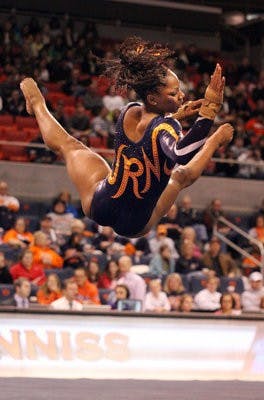 Rachel Inniss performs on the floor, scoring a 9.9 against LSU Friday night.