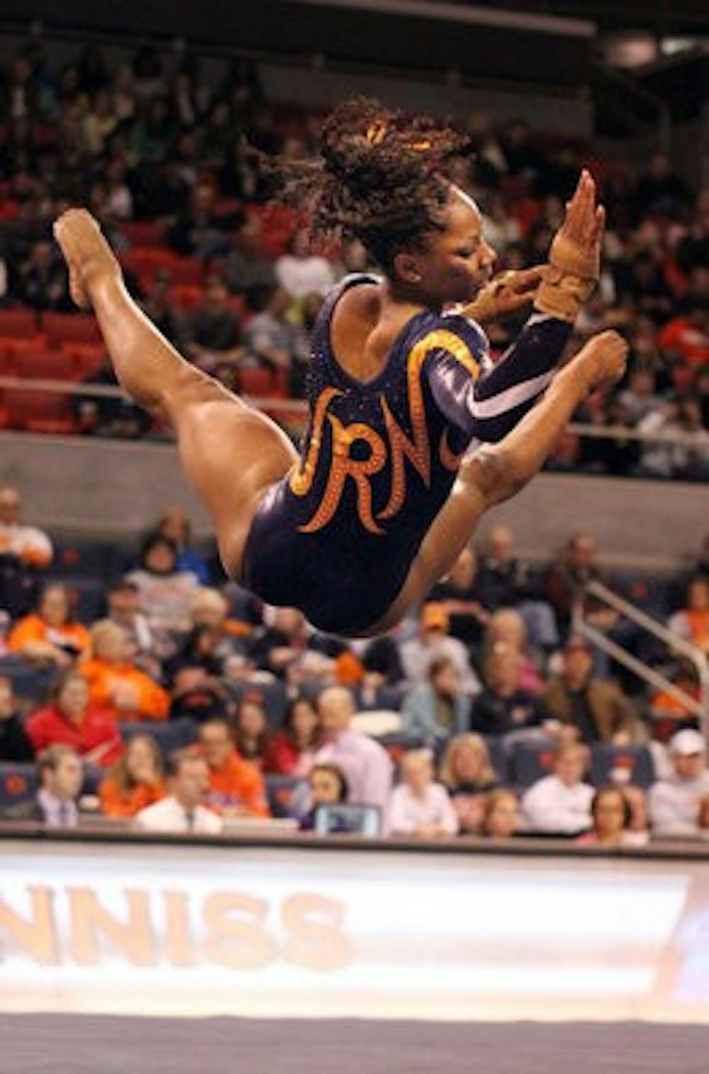 Rachel Inniss performs on the floor, scoring a 9.9 against LSU Friday night.