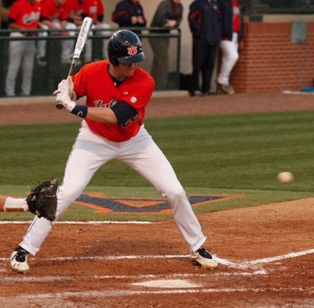 Garrett Cooper readies for the swing to end the third inning. (Courtesy of Auburn Athletics)