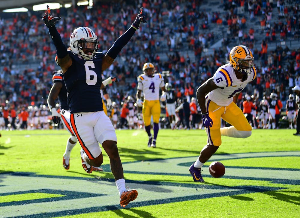 <p>Christian Tutt (6) reacts after a touchdown during the game between Auburn and LSU at Jordan Hare Stadium on Oct 31, 2020; Auburn AL, USA. Photo via: Shanna Lockwood/AU Athletics</p>