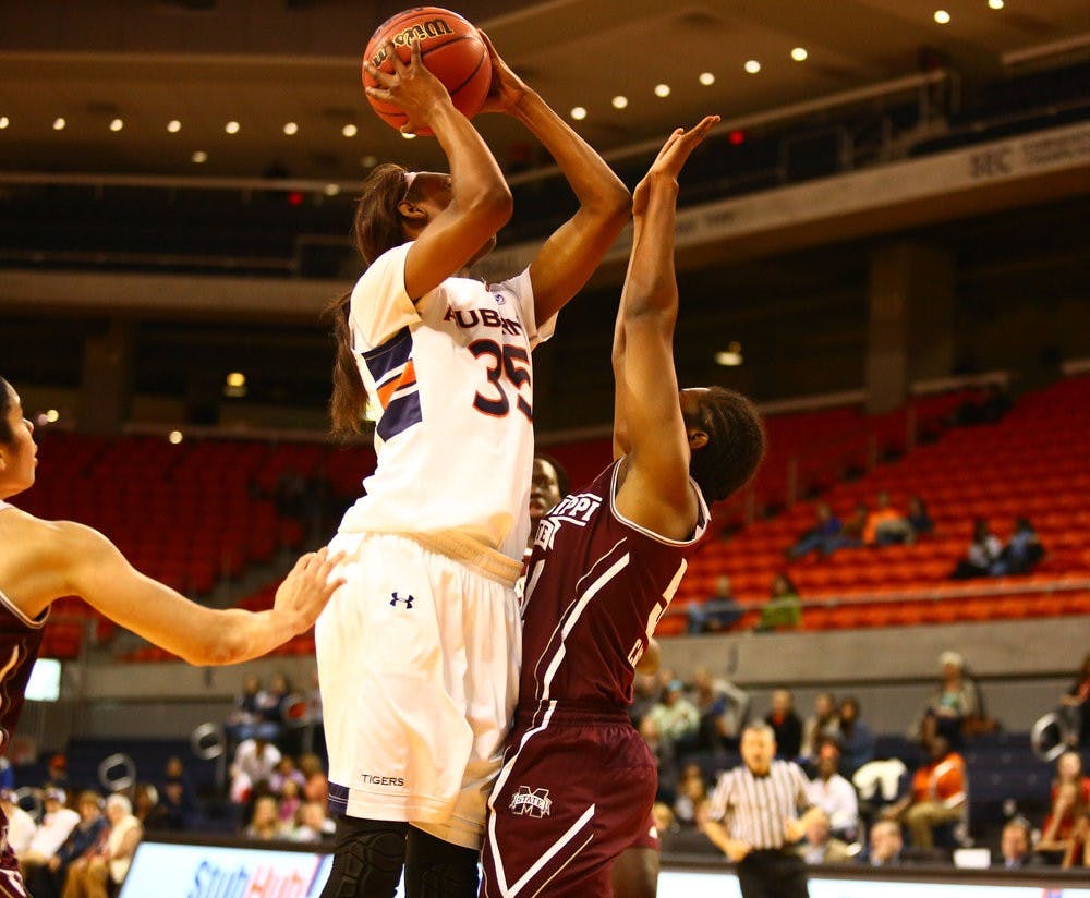 Asia Robeson goes over her opponent for the easy bucket. (Kenny Moss | Asst. Photo Editor)