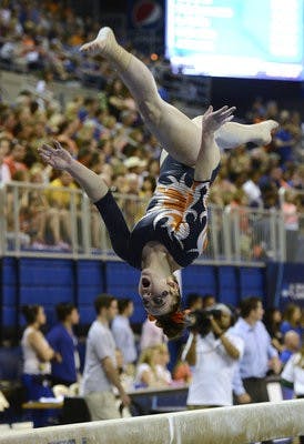 Caitlin Atkinson scored a 9.90 on the beam at the NCAA Gainesville Regional Saturday, April 6. (Courtesy of Todd Van Emst)