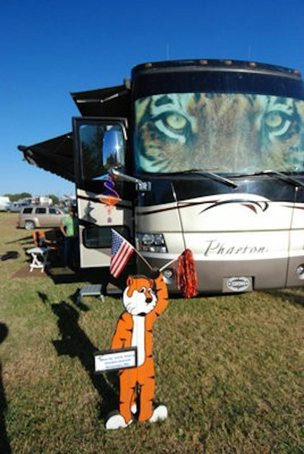 Gary and Marty Underwood's RV, with its tiger-eyes windshield, sits at their usual tailgating spot in the fields off Donahue Drive, near the AU Solar  House. (Derek Lacey /  Associate Campus Editor)