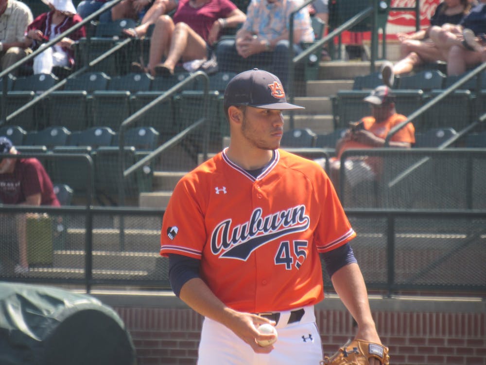 <p>Joseph Gonzalez (45) pitching for Auburn against Texas A&amp;M on May 16, 2021</p>