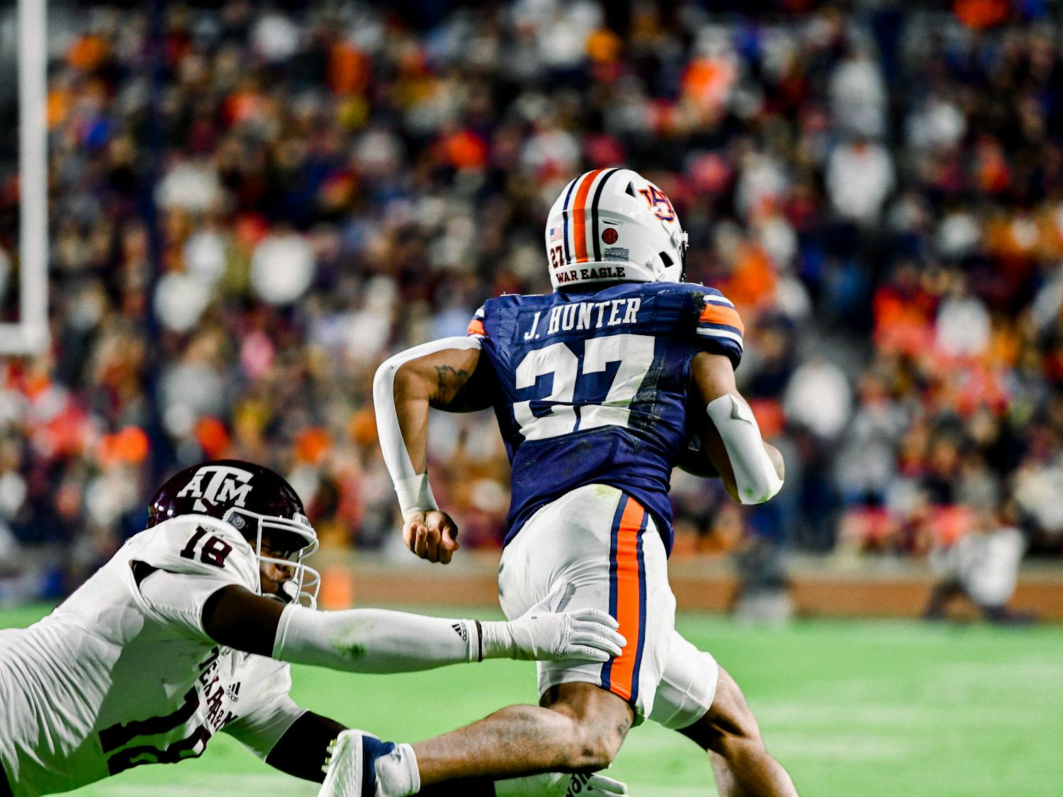 Running Back Jarquez Hunter (#27) outruns a defender in Jordan-Hare Stadium against Texas A&M on November 12, 2022. 