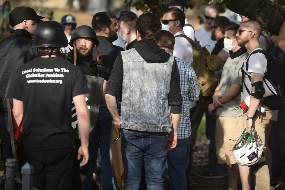 Alt-right protestors talk before Richard Spencer's event at Foy Hall on Tuesday, April 18, 2017 in Auburn, Ala. 