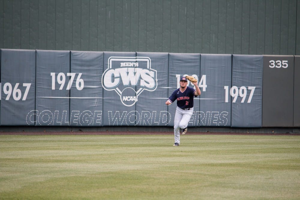 Conor Davis (24) catches the ball&nbsp;for Auburn Baseball against Mississippi State on Saturday, April 14, 2018, in Auburn, Ala.