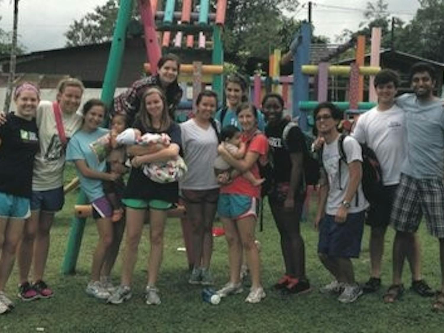 Aeikens and the ASB group hang out on the playground with children at the orphanage in Nicarauga. (Courtesy of Brianne Aeikens)