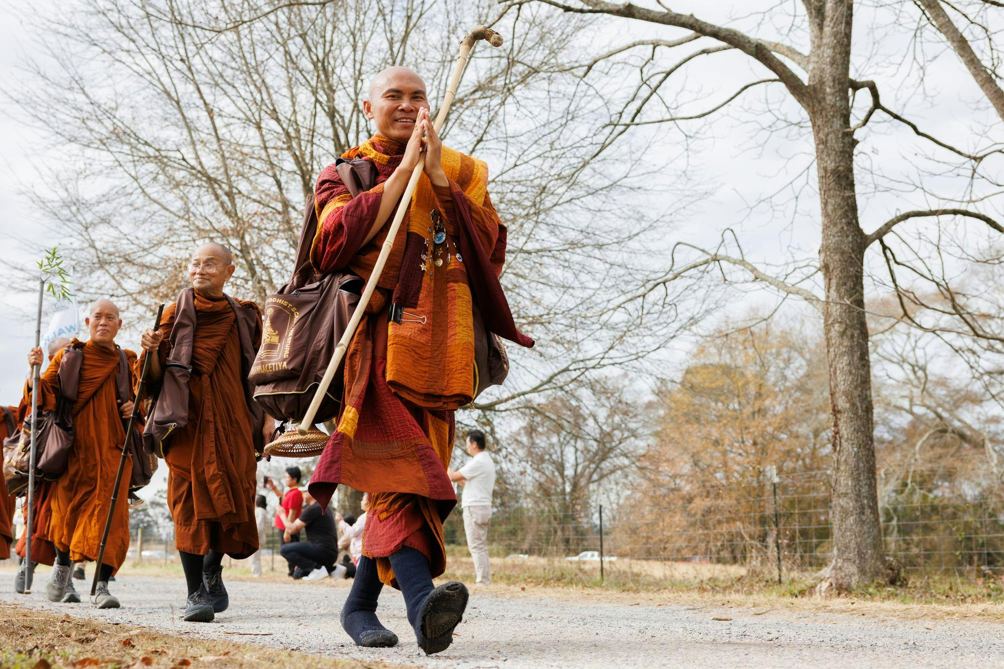 Venerable Monk Bhikkhu Pannakara leads the group of monks to Collins Farm in Cusseta, Ala. for their lunch stop after walking from Opelika, Ala on Dec. 26, 2025.