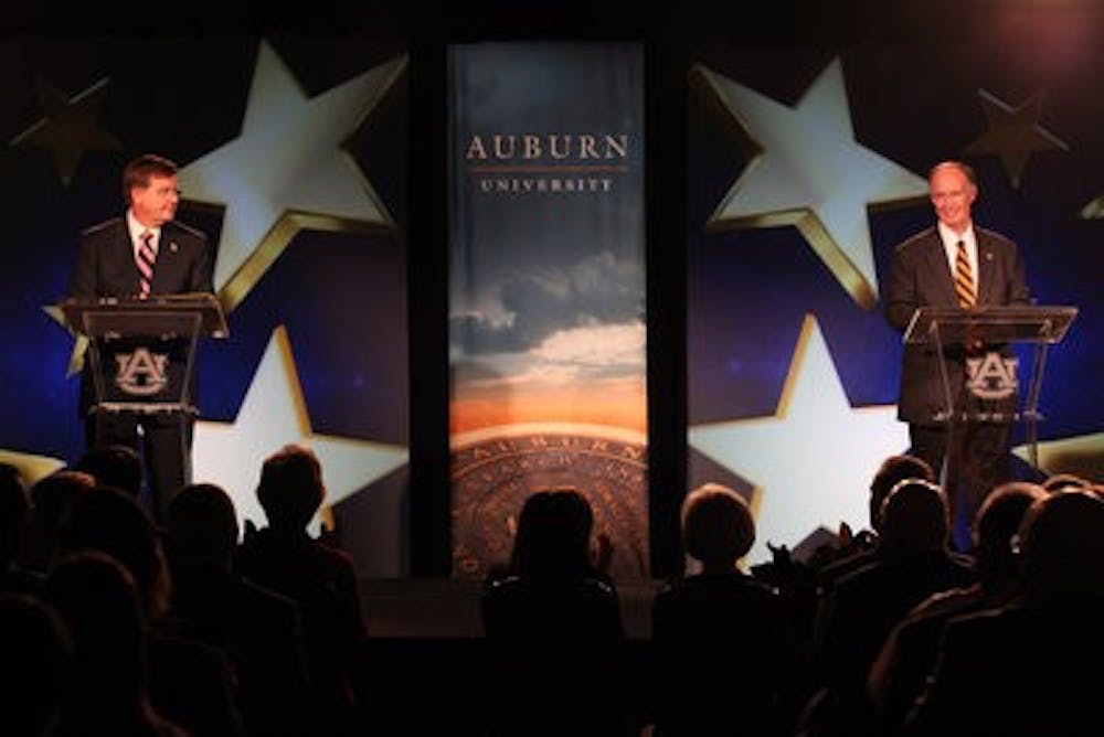 Ron Sparks (left) and Robert Bentley (right), candidates for governor of Alabama, engage in professional debate in the Auburn University Student Center ballrooom Tuesday. (Emily Adams / Photo Editor)