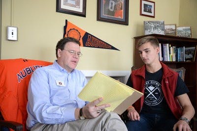 Paul Harris helps students like Jesse Akozbek, junior in electrical engineering, find scholarships.