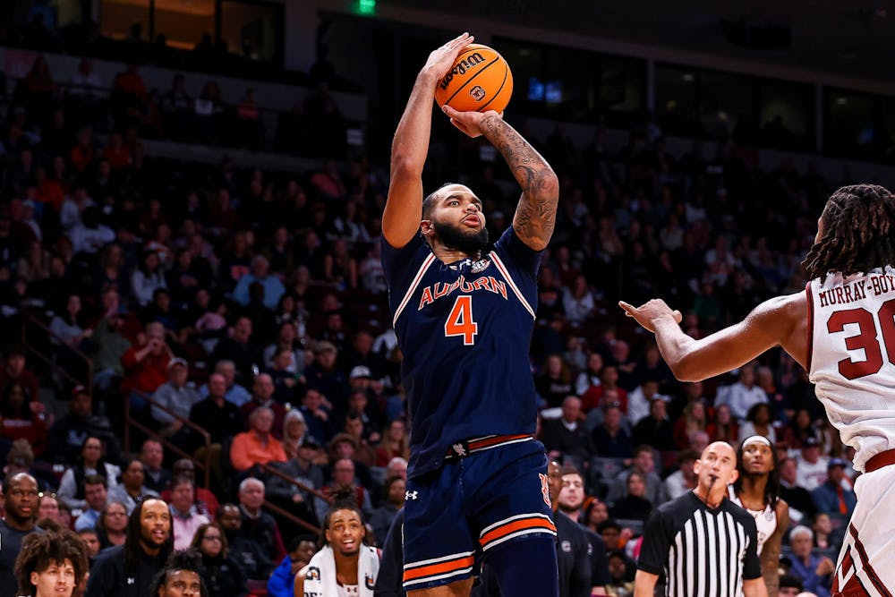 COLUMBIA, SC - JANUARY 11 - Auburn's Johni Broome (4) during the game between the #2 Auburn Tigers and the South Carolina Gamecocks at Colonial Life Arena in Columbia, SC on Saturday, Jan. 11, 2025.

Photo by Zach Bland/Auburn Tigers
