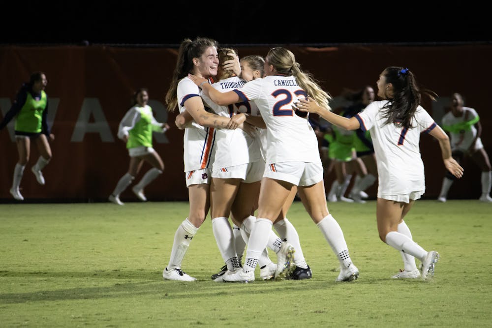 Sydney Thibodaux (#15) celebrates with her teammates Maddie Simpson (#32), Olivia Candelino (#23) and Carly Thatcher (#7) after scoring a goal versus Arkansas at the Auburn Soccer Complex on Oct. 8th. 2023.
