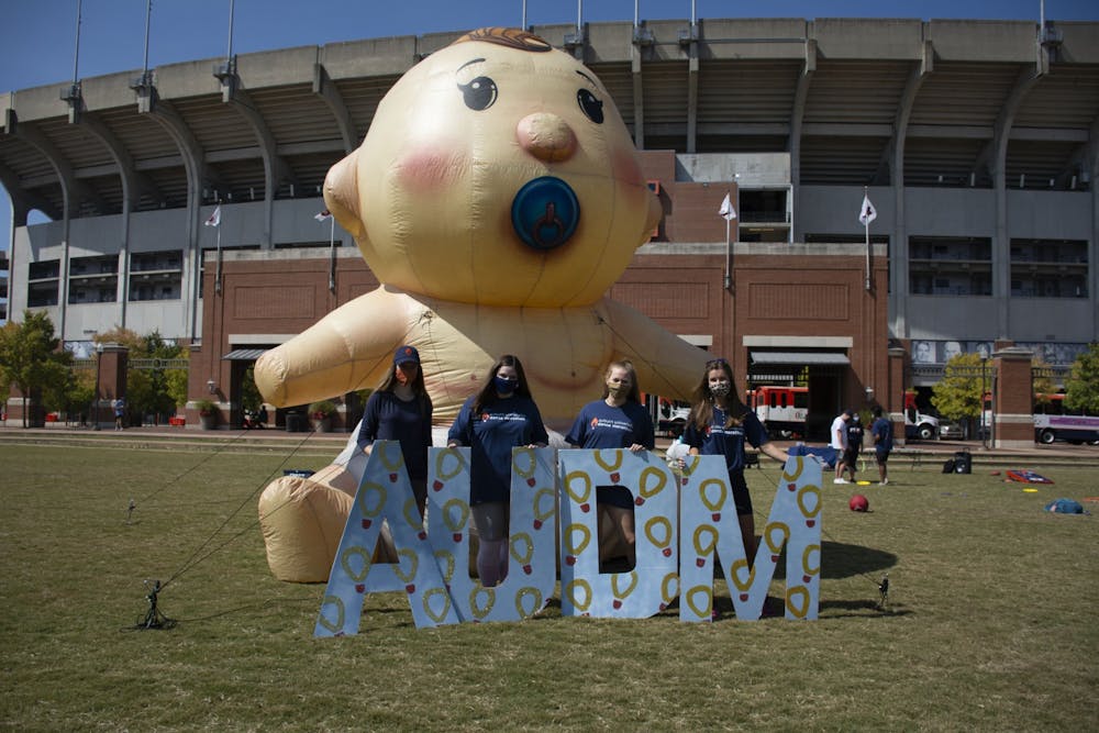 <p>Members of AUDM during a recruitment event on Oct. 5, 2020, in Auburn, Ala.</p>