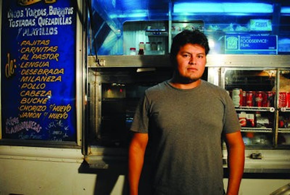 Artemio Trujillo owns Lyly's Foods, the taco truck on Opelika Road. His business is the first of its kind in the area. (Maria Iampietro / PHOTO EDITOR)
