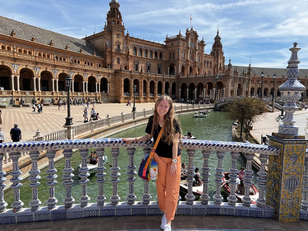 Writer abroad Sami Grace Donnelly poses in front of Plaza España in Seville, Spain. 