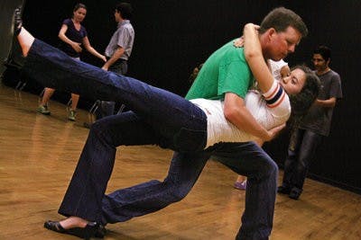 Abigail Cutchen, junior in marketing and recruiting, and Daniel Cordell, senior in history, end a dance with a dip at the Auburn University Swing Dance Association. (Rebekah Weaver / Assistant Photo Editor)