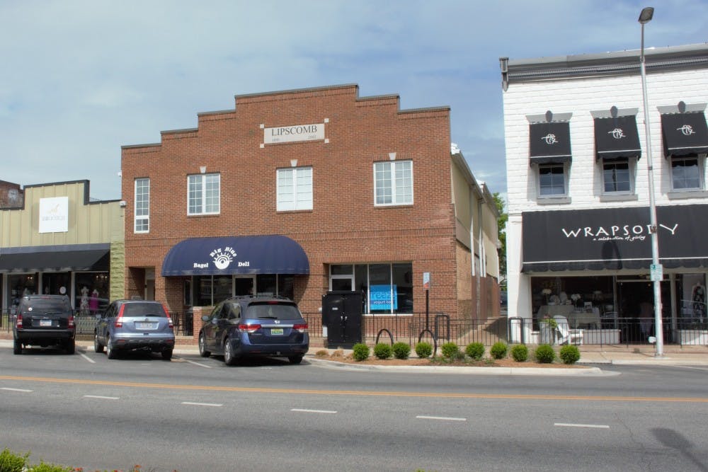 The sign for the new frozen yogurt shop Freeze in the window of the downtown shop.