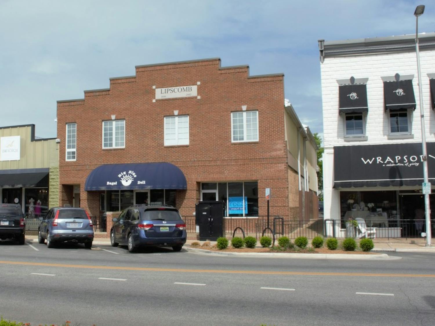 The sign for the new frozen yogurt shop Freeze in the window of the downtown shop.