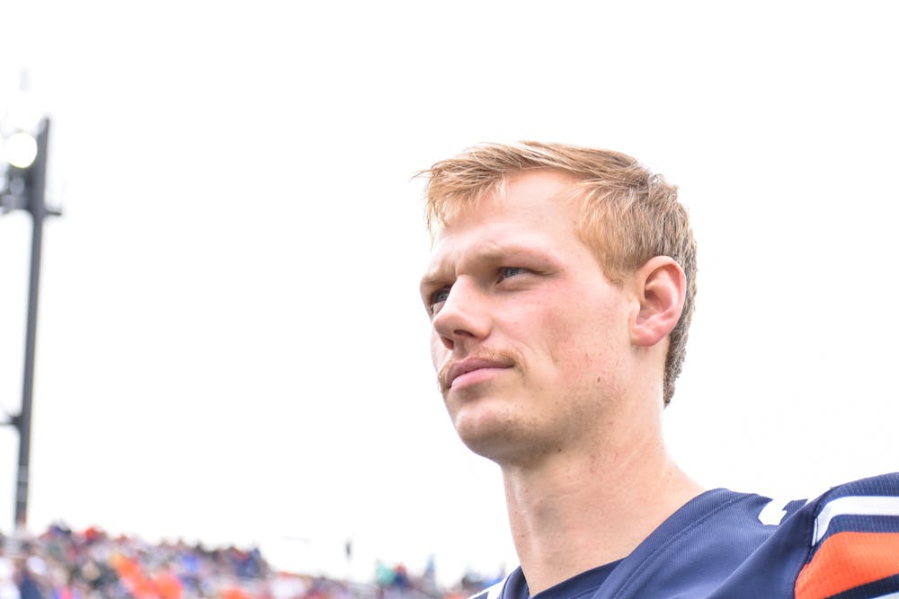 <p>December 28, 2021; Birmingham, Alabama; Anders Carlson (26) takes to the sidelines to watch Auburn take on the University of Houston in the 2021 Birmingham Bowl.</p>