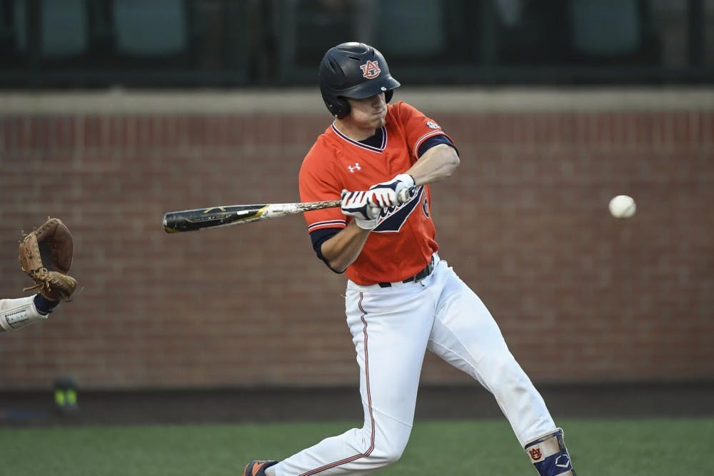<p>Matt Scheffler (6) swings for the ball during Auburn baseball vs. Georgia Tech on April 2, 2019, in Auburn, Ala.</p>