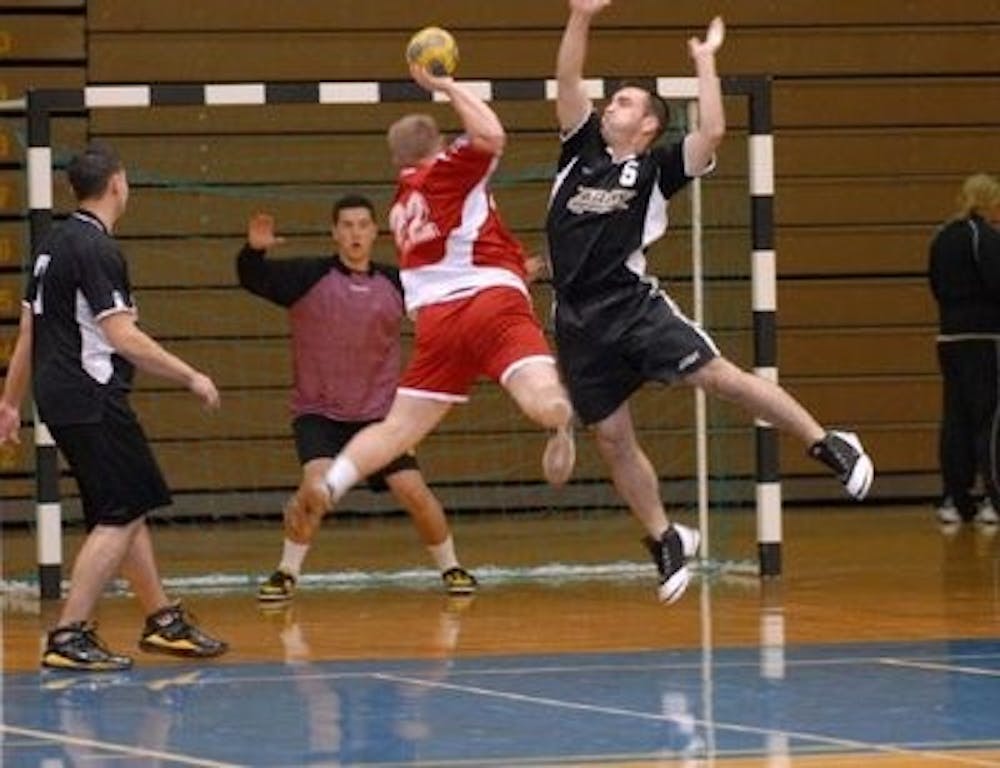 West Point Military Academy (red) and the Chicago Inter Handball Club (black) face off in a team handball match. (Contributed)