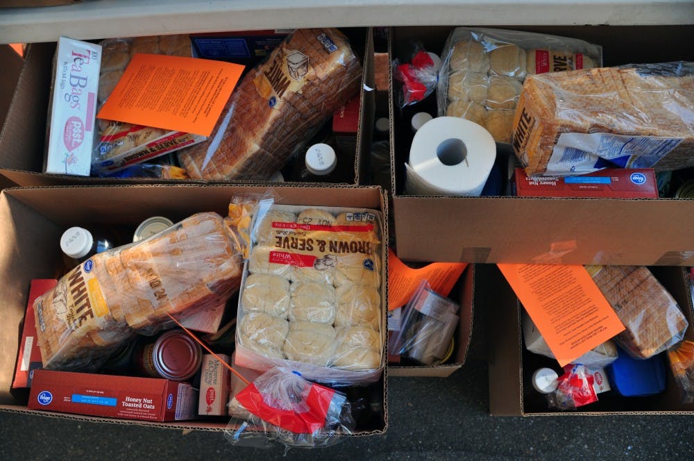 Thanksgiving food boxes at the&nbsp;Auburn United Methodist Church Food Pantry contain canned goods, bread, eggs and more on Friday, Nov. 18, 2016.