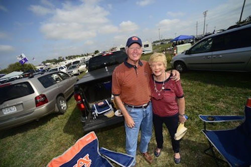 Auburn fans Wade and Sue Sadler tailgate prior to Auburn's game against Kansas State on September 18, 2014. (Zach Bland)