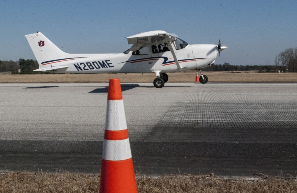 <p>Auburn University Flying Team pilot practicing landing at the Auburn University Regional Airport in Auburn Ala. on Sunday Feb. 28.</p>