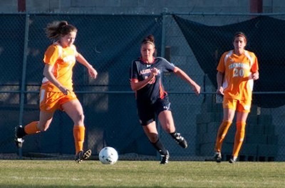 Christie Schweer pursues a Tennessee player. Philip Smith / ASSISTANT PHOTO EDITOR