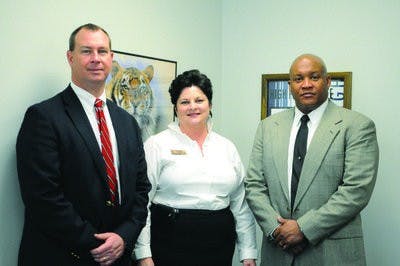 From left: Ross Reed, Lisa Hayes and Anthony Jeter, assistant principals of Auburn High School, exercise their skills through coaching, teaching and extracurriculars. (Christen Harned / ASSISTANT PHOTO EDITOR)