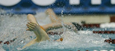 Zane Grothe swims in the preliminary heats of the 200 yard freestyle..Auburn at SEC Swimming and Diving Championships on Thursday, Feb. 21, in College Station, TX..Prelims. (Courtesy of Todd Van Emst / AUBURN ATHLETICS PHOTOGRAPHER)