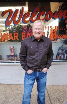 Trey Johnston carries on an Auburn tradition in J&M Bookstore, which was started by his father, George Johnston, and Paul Malone. (Maria Iampietro / PHOTO EDITOR)