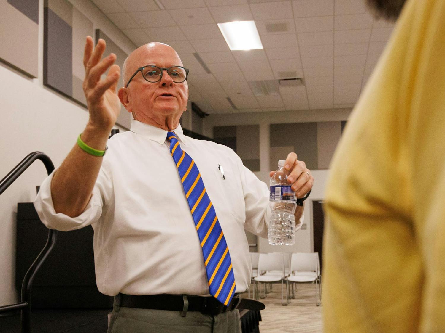Congressional candidate Lee McInnis talks with potential voters during an open meeting in Opelika, Alabama in Nov. 19, 2025.