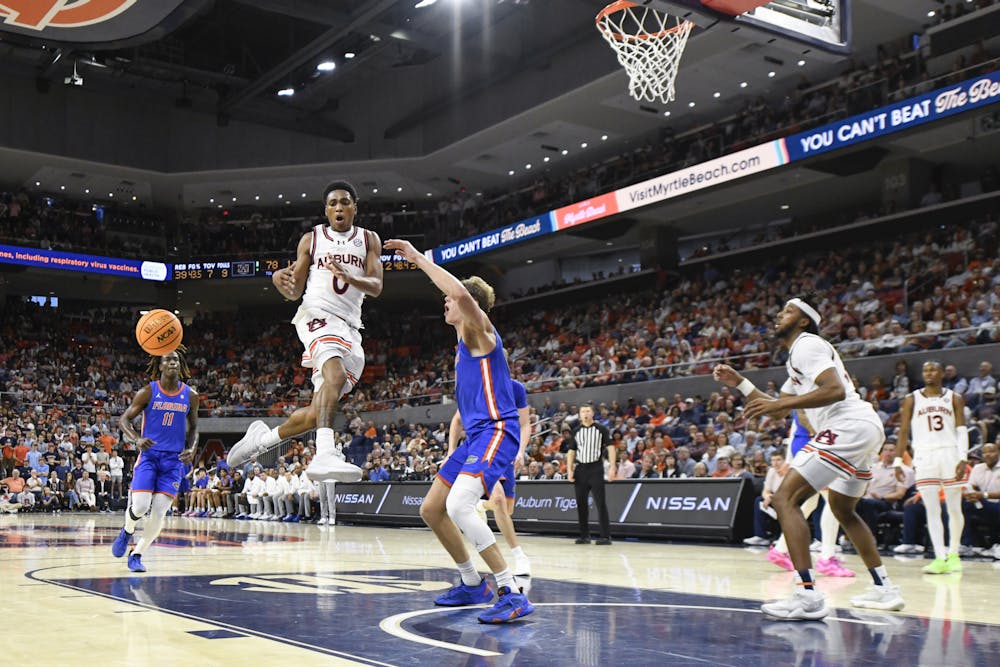 Auburn Guard Tahaad Pettiford (0) loses control of the ball during a matchup against the Florida Gators in Neville Arena on Feb. 8, 2025.