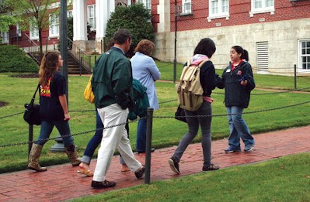 Amanda Baldonado, a junior in HDFS, shows prospective students around the Auburn campus.
