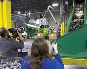 Isaac Brown and Ana Habib film the e-waste processing machine named "David II " at Creative Recycling Systems in Morrisville, N.C. The machine was named in reference to the Goliath amount of e-waste being created in the United States. (Courtesy of the Terra Blight crew)