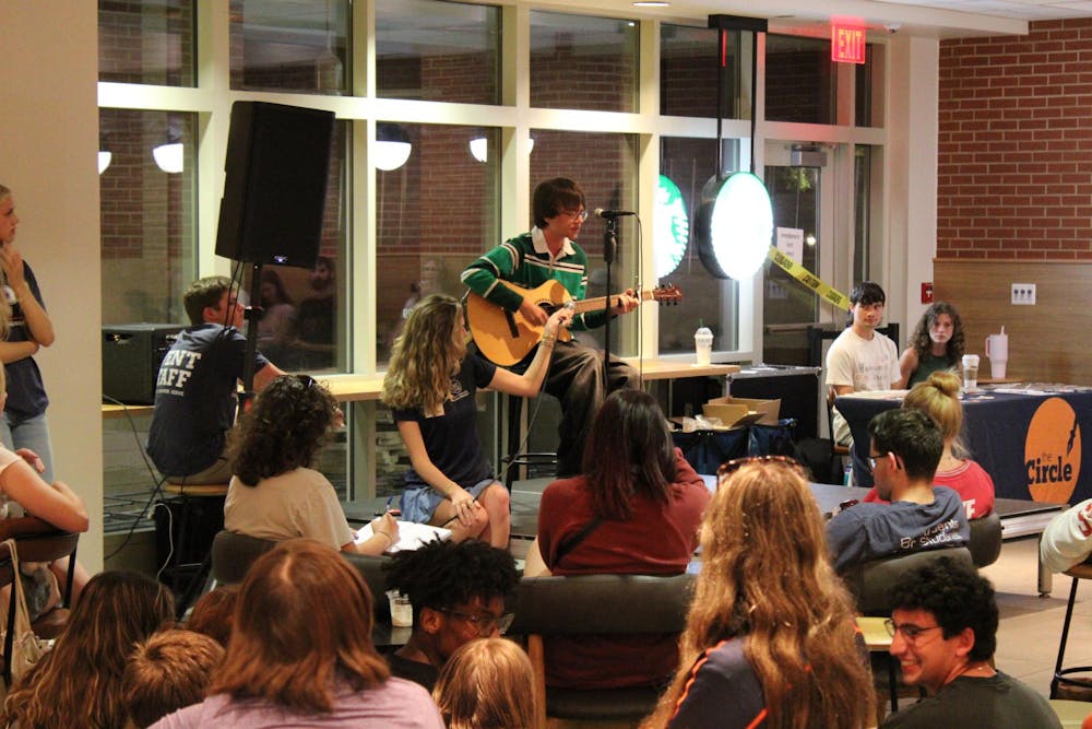 <p>Students performing for their peers in the Melton Student Center for UPC and The Auburn Circle's Open Mic Night on Monday, Sep. 15, 2025.</p>