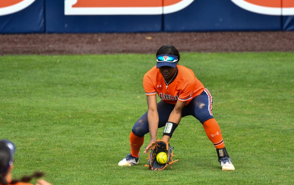 <p>Makayla Packer (#10) catching a ball in the outfield against NDSU on February 26th 2023</p>