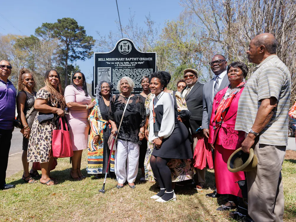 Family of the late Katie Bell Avery stand in front of the newly erected historical marker in front of Bell Missionary Baptist Church, Sunday, March 22, 2026 in Auburn, Alabama.