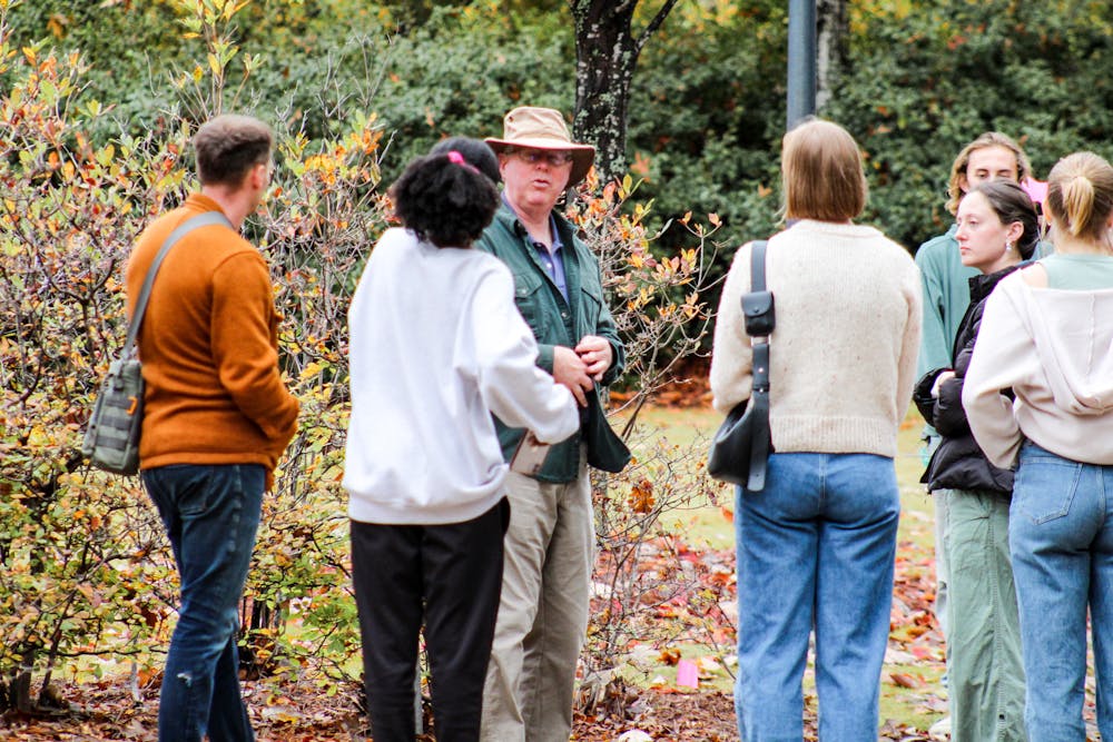 Alan Booker leading participants of Foy Sensory Garden Design Workshop in discussion of different approaches to entrance design on Cater Lawn on Nov. 11, 2023.