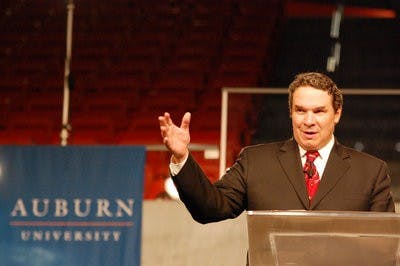 New York Times bestselling author Greg Mortenson, writer of "Three Cups of Tea: One Man's Mission to Promote Peace . . . One School at a Time," addresses the crowd at Auburn Arena Tuesday. (Charlie Timberlake / ASSISTANT PHOTO EDITOR)