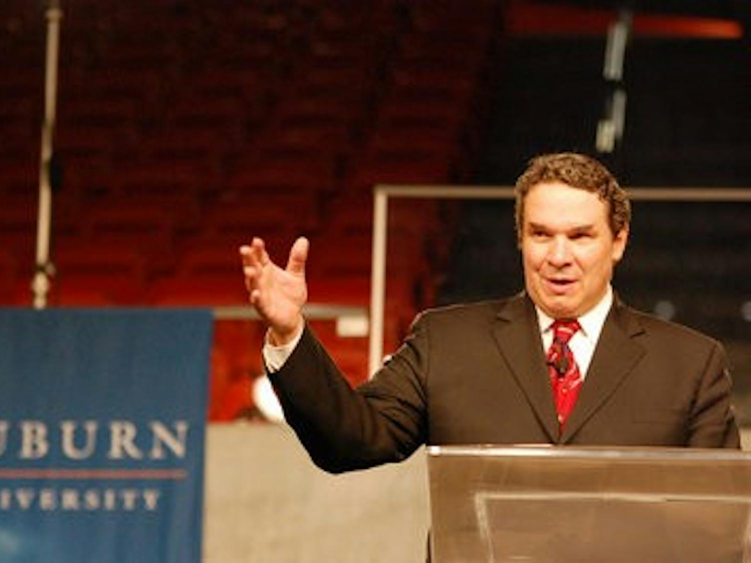 New York Times bestselling author Greg Mortenson, writer of "Three Cups of Tea: One Man's Mission to Promote Peace . . . One School at a Time," addresses the crowd at Auburn Arena Tuesday. (Charlie Timberlake / ASSISTANT PHOTO EDITOR)