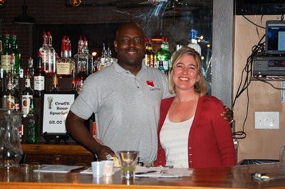 Lisa Ditchkoff and Clemon "Bird man" Byrd stand behind the bar at the Event Center Downtown.
