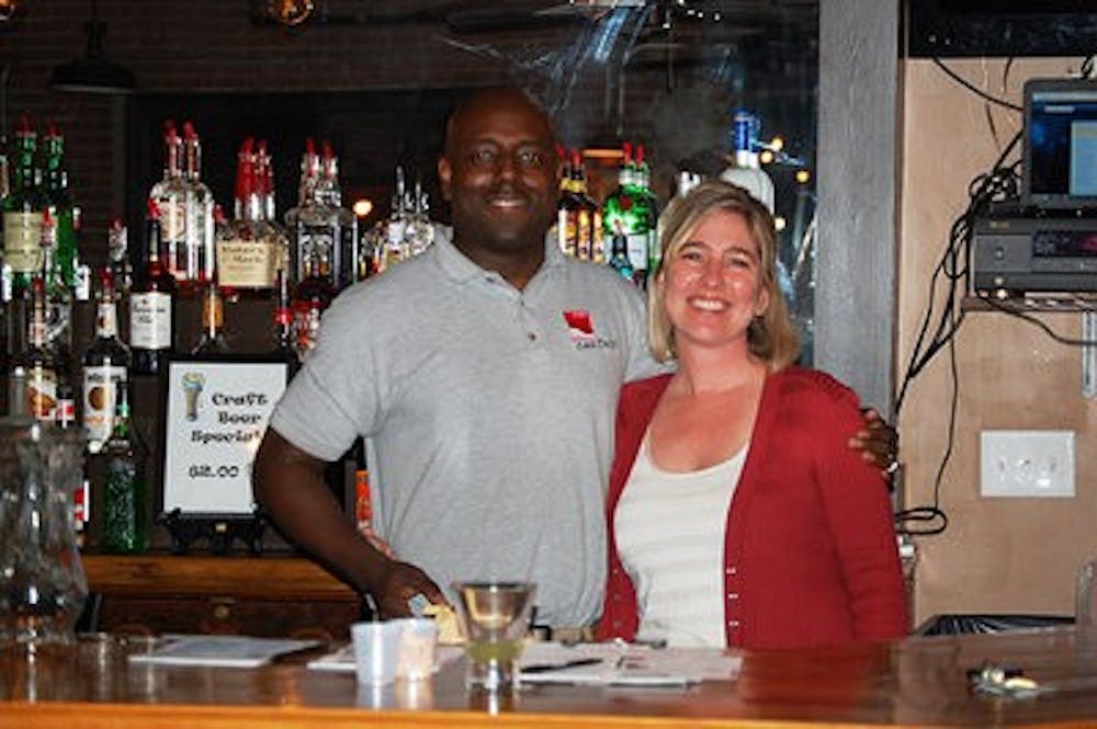 Lisa Ditchkoff and Clemon "Bird man" Byrd stand behind the bar at the Event Center downtown (Photo contributed by Nick Hines / Community Writer)