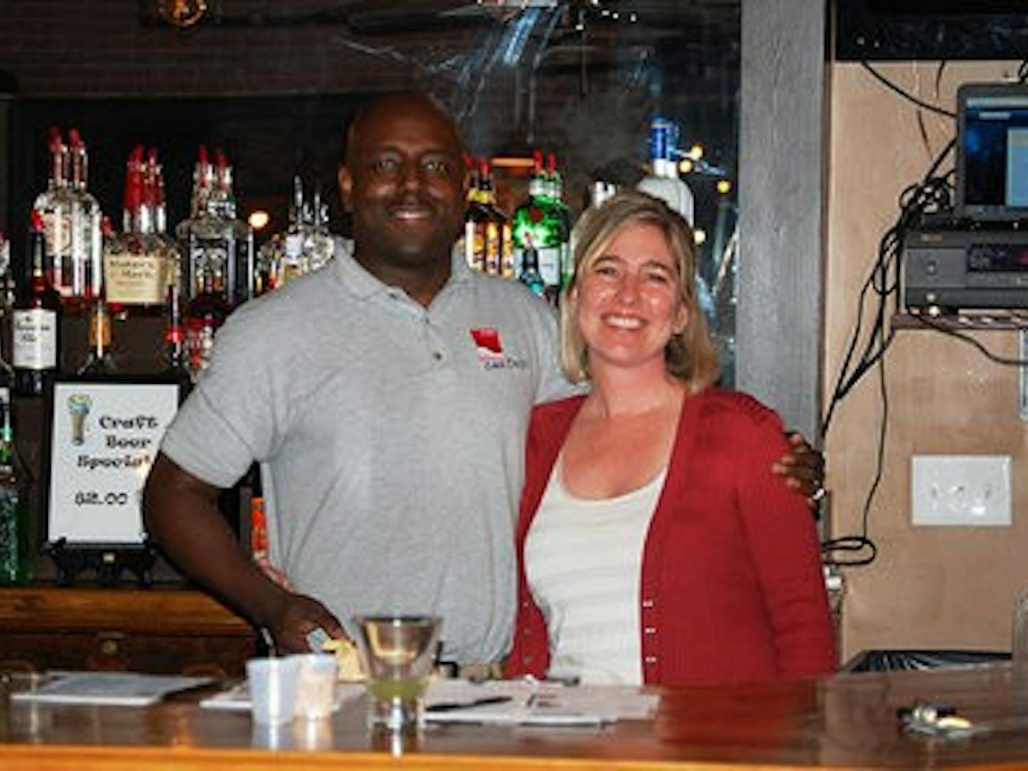 Lisa Ditchkoff and Clemon "Bird man" Byrd stand behind the bar at the Event Center Downtown.